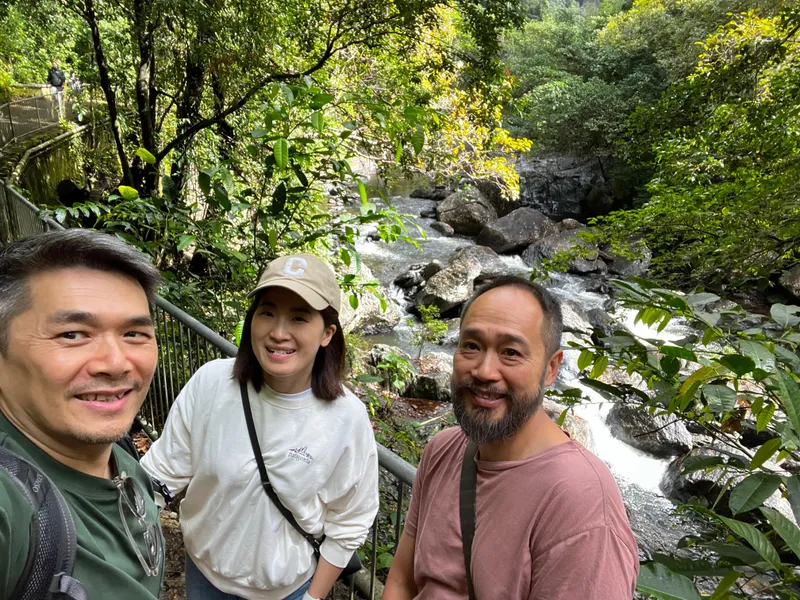 The gang posing while on the track, with the creek behind