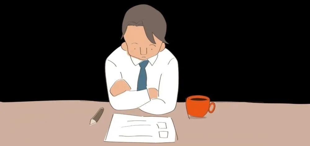 Illustration of a frustrated office worker with crossed arms at a desk