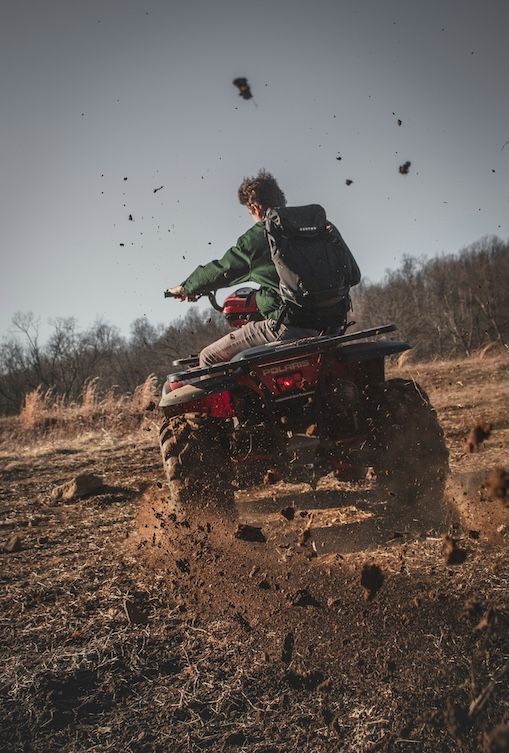 ATV rider on a dirt trail