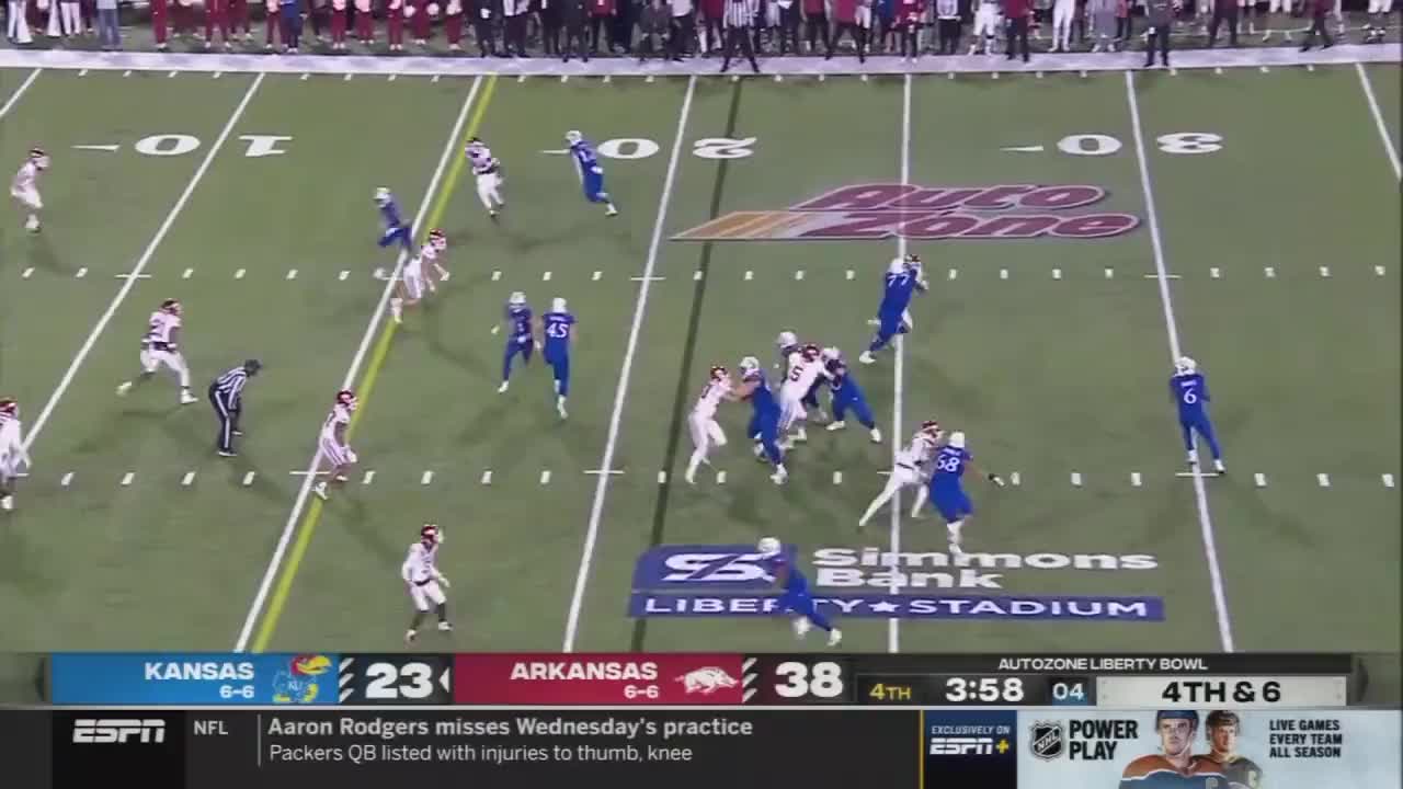 Kansas rallies, but Arkansas wins Liberty Bowl 55-53 in 3OTs