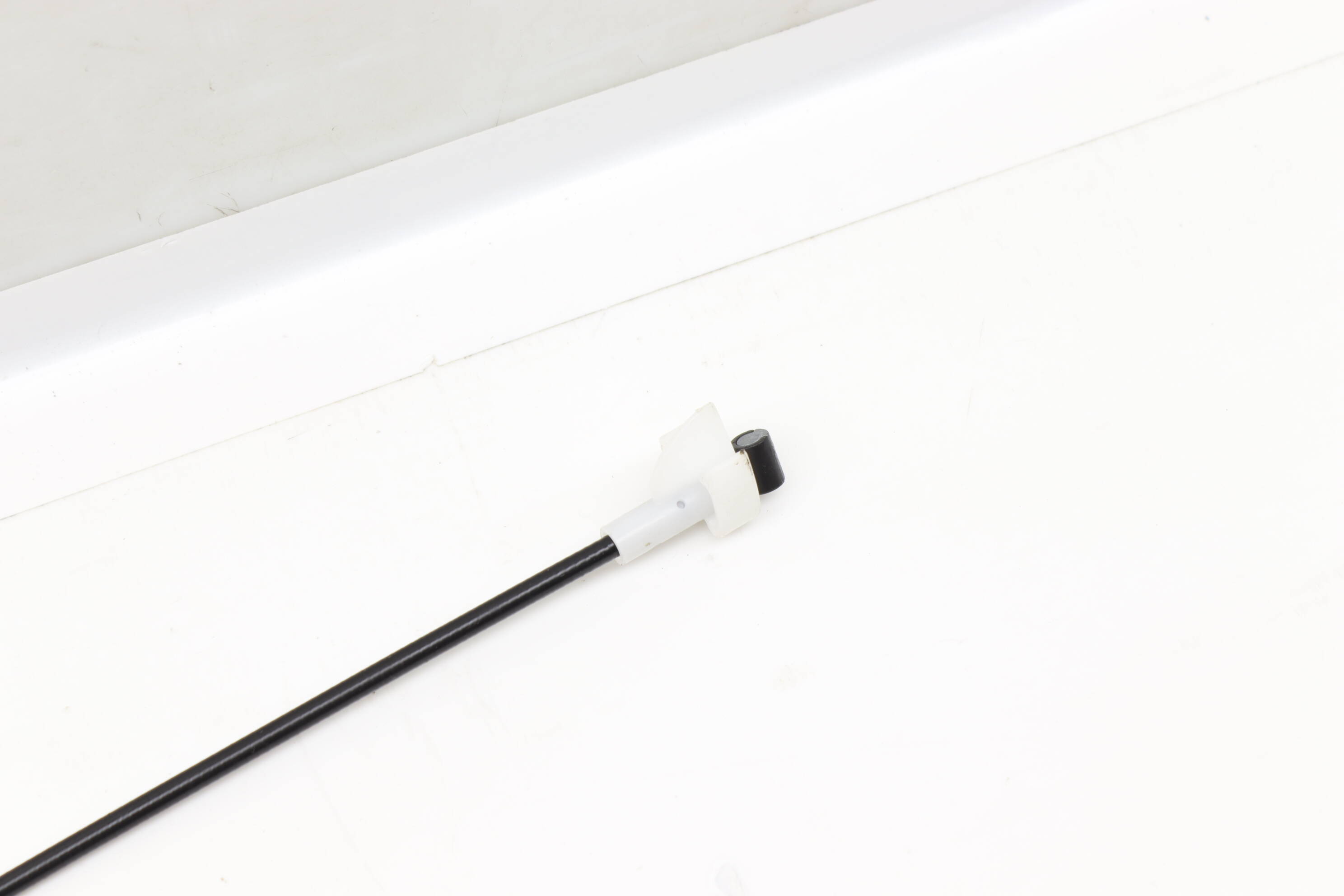 INTERIOR DOOR HANDLE RELEASE / BOWDEN CABLE