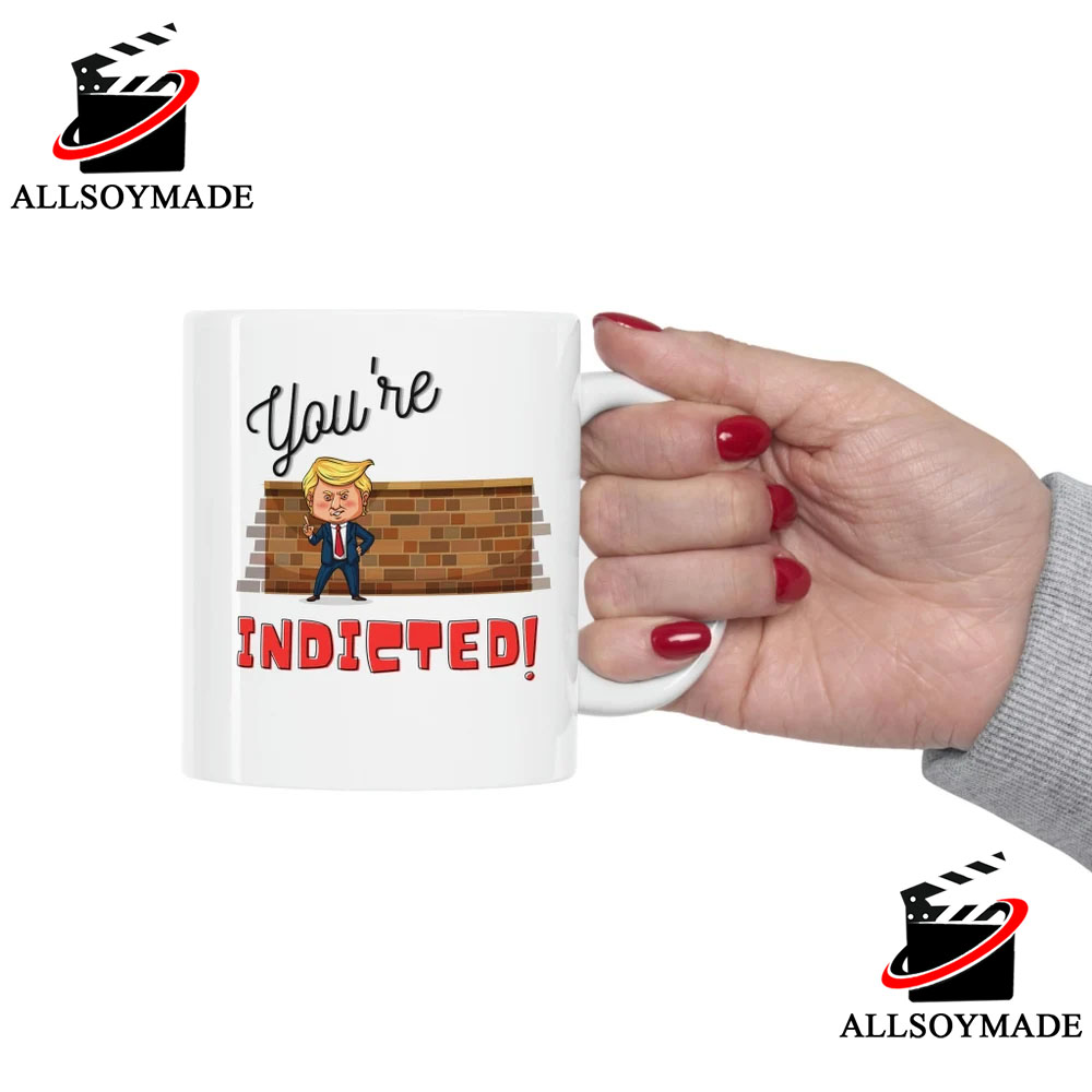 https://storage.googleapis.com/woobackup/allsoymade/2023/04/Cheap-Trump-Arrested-Mug-Funny-You-Are-Indicted-Donald-Trump-Coffee-Mug.jpg