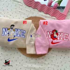 https://storage.googleapis.com/woobackup/allsoymade/2023/11/5Edo4WbO-g5k2HFwr-Cheap_Ariel_x_Eric_Disney_Nike_Couple_Embroidered_Sweatshirt__0-300x300.webp