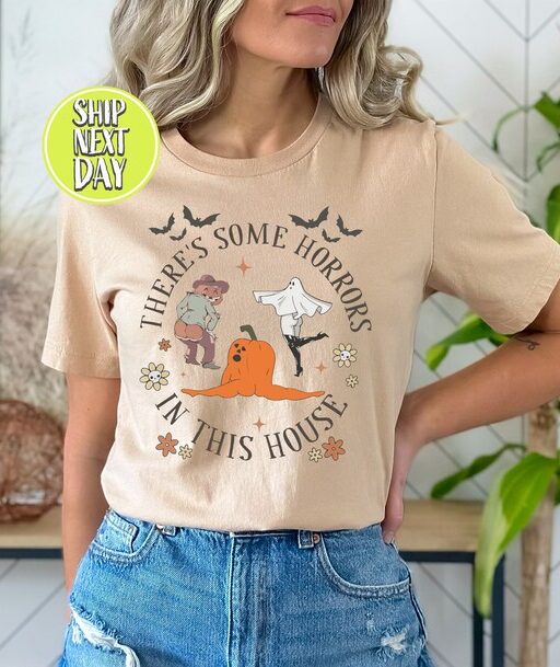 There’s Some Horrors In This House T-Shirt, Funny Halloween Pumpkin Shirt, Funny Ghost Tshirt, Halloween Gifts, Spooky Season Shirt -HC45