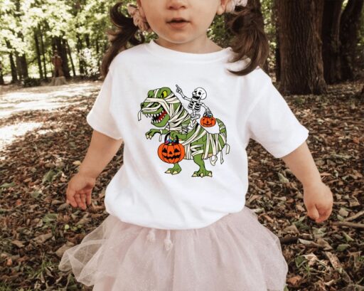 Skeleton Rides Dinasour Pumpkin Toddler Shirt, Halloween Boy Skeleton Shirts, Cool Halloween Kids, Happy Halloween Dinasour Shirt -HC011