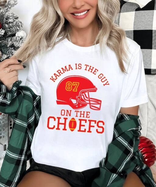 Karma is the guy on the Chiefs Shirt, Travis and Taylor Sweatshirt