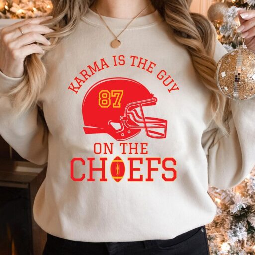 Karma is the guy on the Chiefs Shirt, Travis and Taylor Sweatshirt