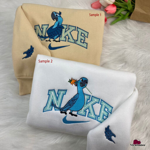 Cute Rio Movie Blu And Jewel Couple Nike Embroidered Sweatshirts, Nike Embroidery Matching, Personalized Gifts For Him