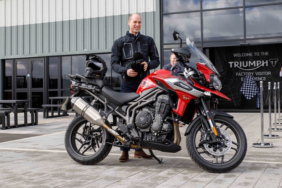 HRH the Duke of Cambridge rides in to visit Triumph Motorcycles