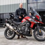 HRH the Duke of Cambridge rides in to visit Triumph Motorcycles