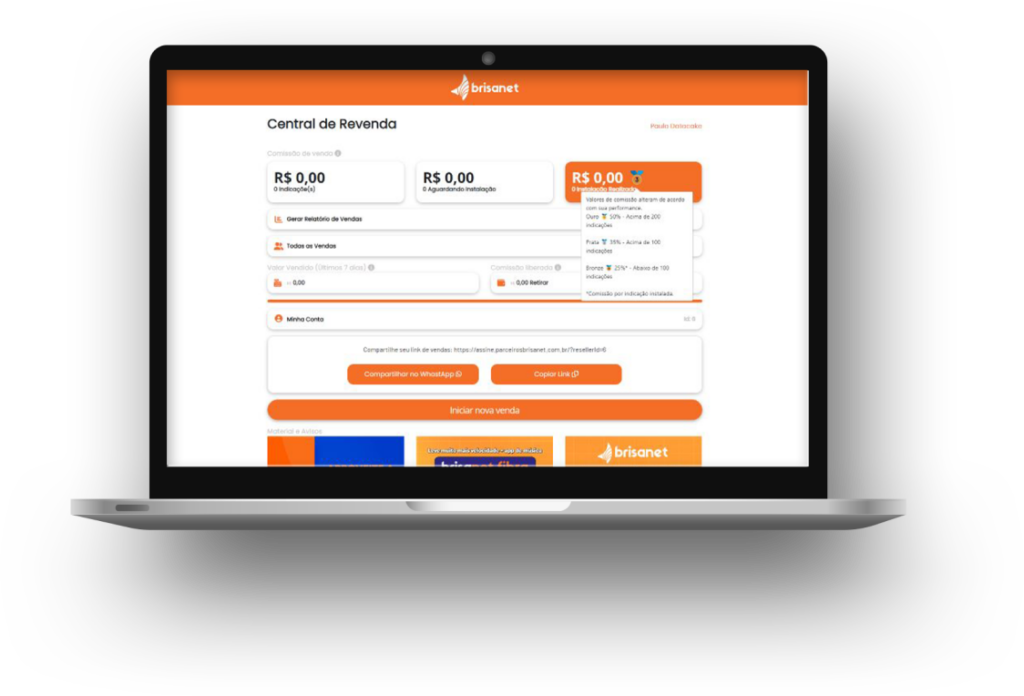 Painel do revendedor da Datacake em um notebook — Central de Revenda com comissionamento, valor vendido, link de vendas e materiais