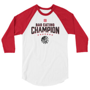 3 Quarter red sleeve baseball tee, saying "BAO EATING CHAMPION" in large font with stars and a grunge-y bao illustration below it