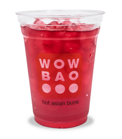 A Wow Bao branded cup full of hibiscus iced tea. It has a bright pinkish-red color to it.