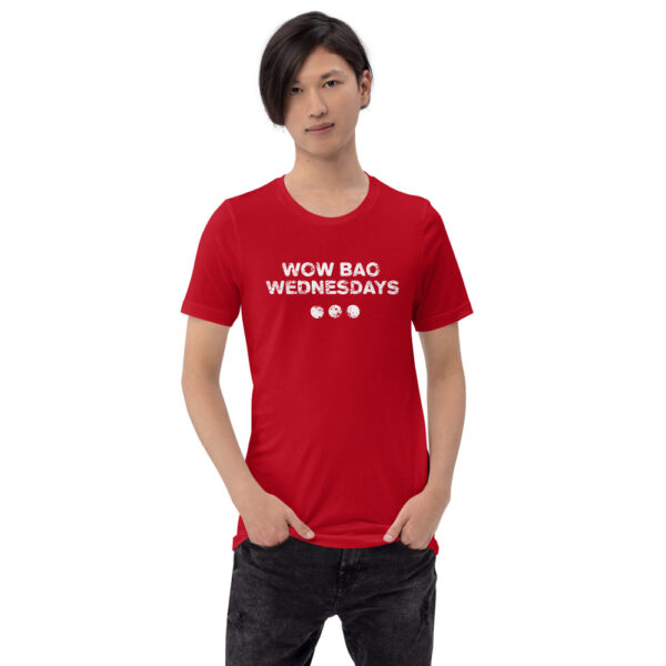 Person wearing red tshirt with "Wow Bao Wednesdays" in the center with 3 dots below it