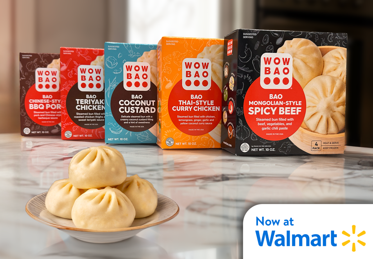 CPG boxes lined up on a kitchen counter, a plate of bao in the foreground, "now at walmart" in the bottom right corner of the image