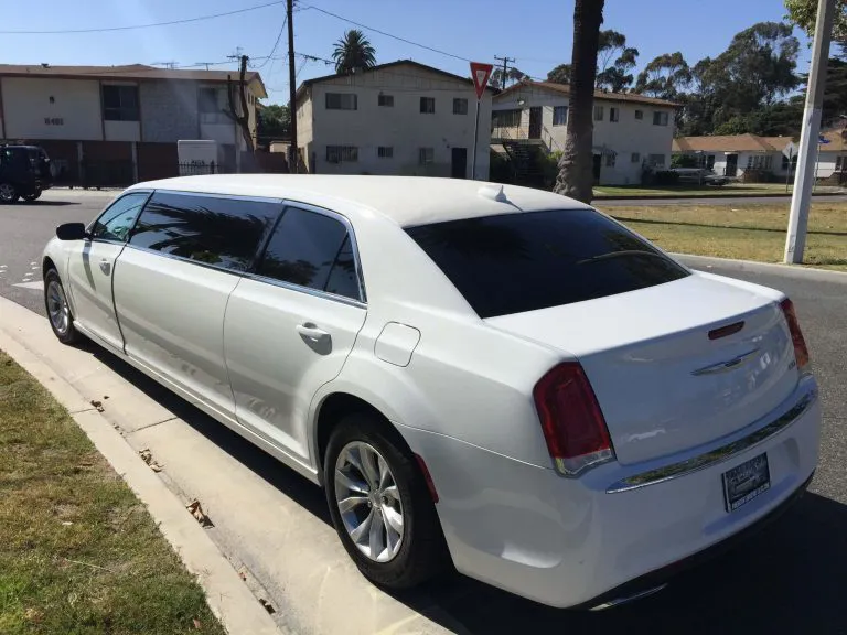 2015-white-70-inch-chrysler-300-limousine-for-sale-6228-left-rear-scaled-768x576