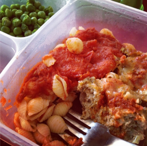 single serving of Chicken Parmesan Mini Meatloaf with pasta and marinara and peas