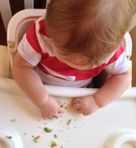 Toddler self eating finger food