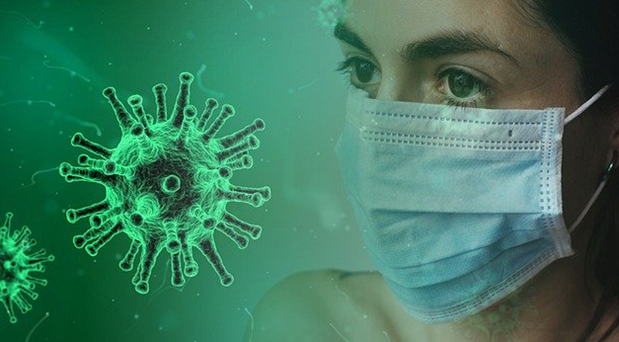 An image of coronavirus and a woman wearing a mask