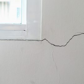 New House Wall Crack Near Window Frame