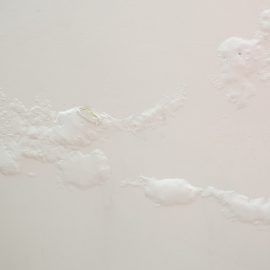 Bubbles under paint on the wall