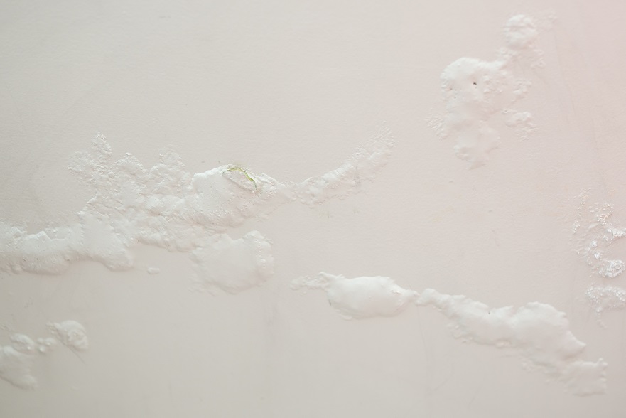 Bubbles under paint on the wall