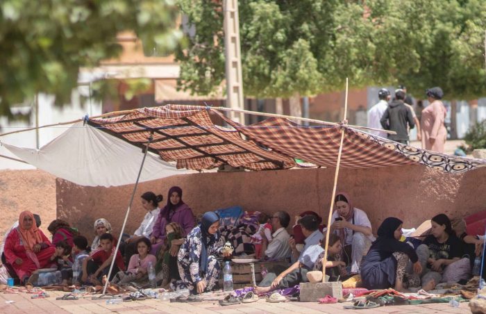 Morocco Earthquake. Families sit under makeshift shelters in villages across the Atlas Mountains. Sky News. 3x2