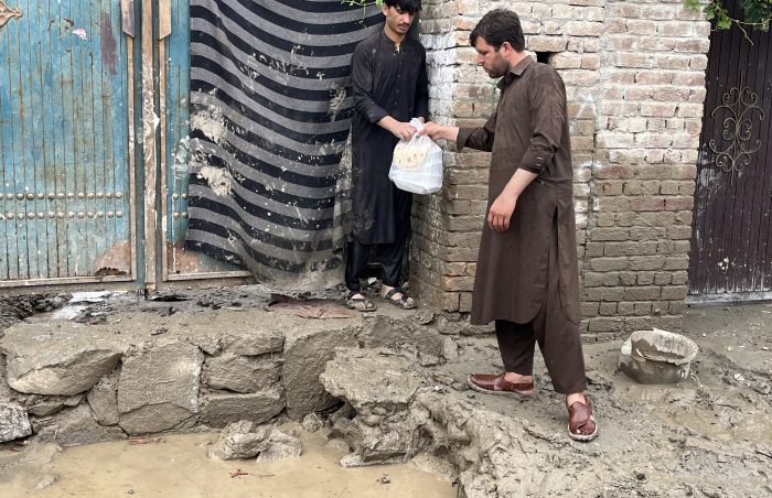 Our volunteers distribute the fresh cooked meal to poor households door to door in Afghanistan