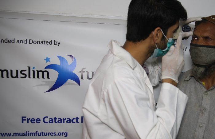 Eye Examination at free health clinic in Pakistan