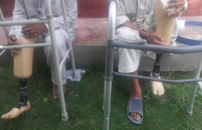 Pair of elderly gents in Pakistan happy with their new prosthesis fitting