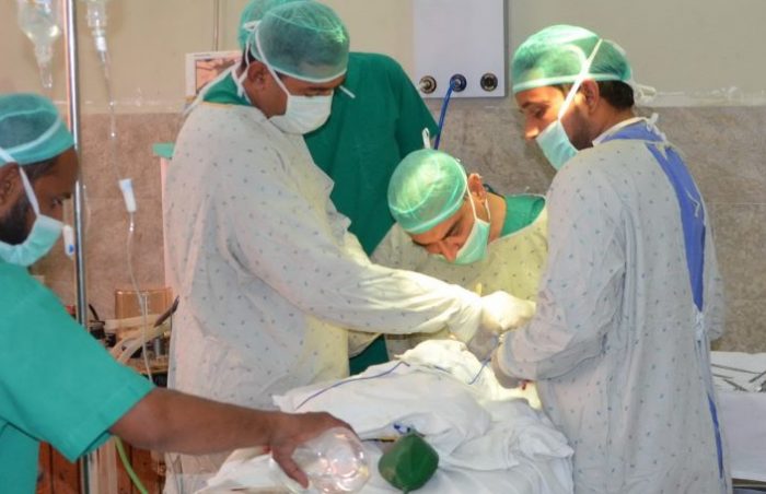 Surgical team at work at a hospital for the poor and needy in Karachi, Pakistan