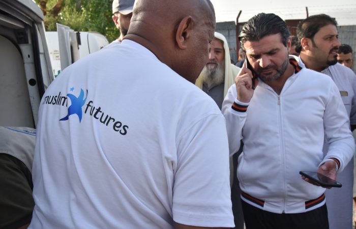 Volunteers distribute cooked prepacked food for Muslim Futures to the Syrian refugees in Lebanon.