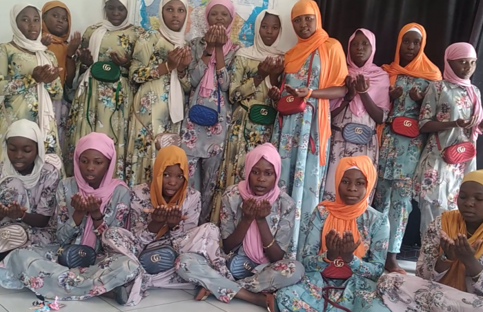 Orphan girls in the Children's Eco Village Tanzania recieve their new Eid clothes.