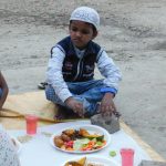 Young boy in India ready for Iftar