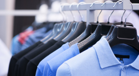 clothing on hangers at the boutique.