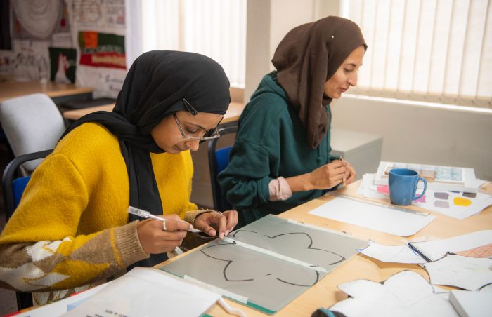 Artist, Haseebah Ali, with participant