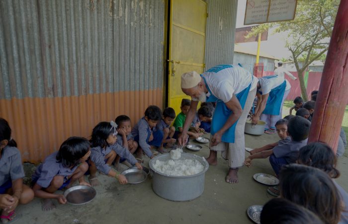 Charity Meals Workers distributing Meal to Kids