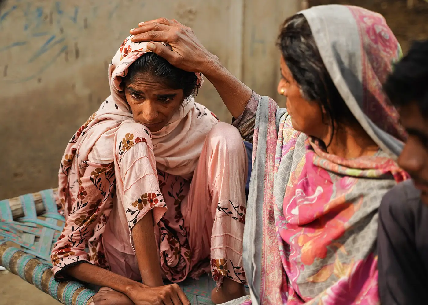 Shamim, caring for her daughter