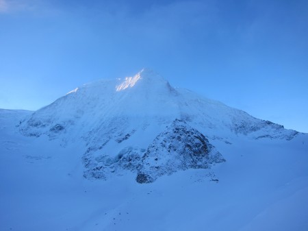 Fresh snow and clearing weather at the Dix hut, looking across at Mont Blanc de Cheilon.