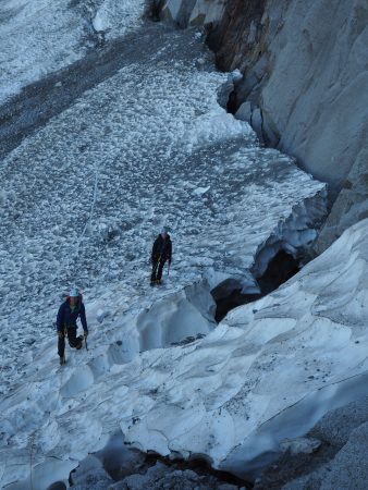 Crossing the bergshrund at the start of the route.
