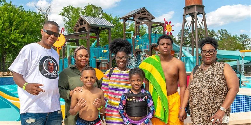 Family in front of our water playground. 