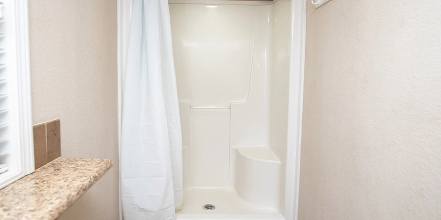 Full bathroom featuring a stand-up shower.