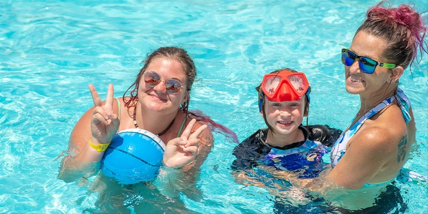 Campers enjoying the heated pool at our East Texas park.