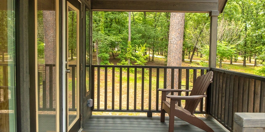 Rosa Cabin porch with furniture. 