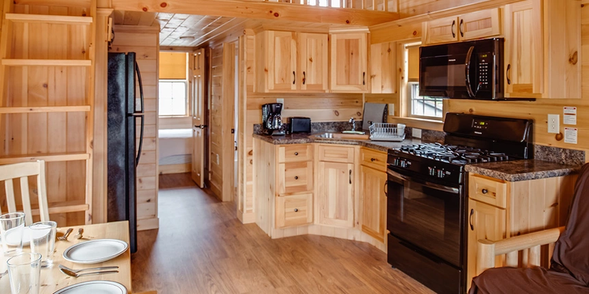 Have access to a full kitchens in these Jellystone Park cabins. 