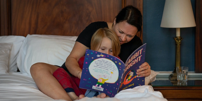 Take some time in the evening to read a story and sing some songs with the whole family!