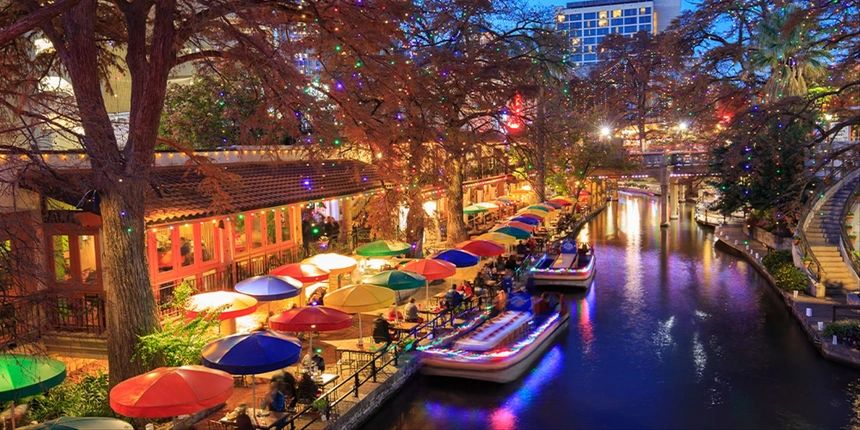 River Walk in San Antonio lit up at night. 