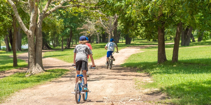 Kids enjoyeing the great outdoors on their bikes thorugh one of our nature trails. 