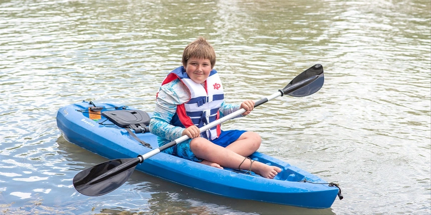 Boy kayaking in the Guadalupe River