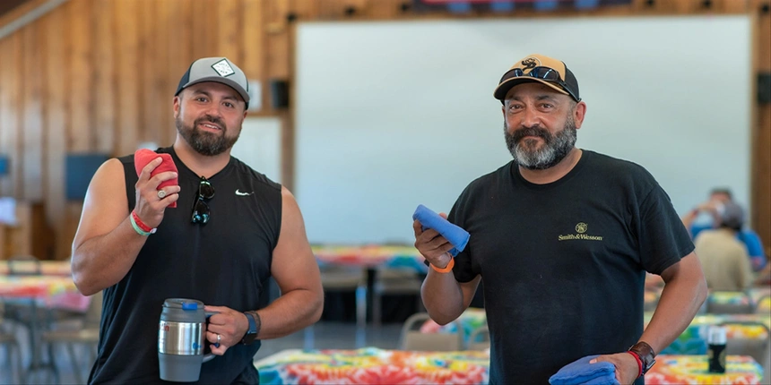 Campers playing cornhole.